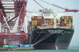 A cargo ship carrying containers. (Getty Images)
