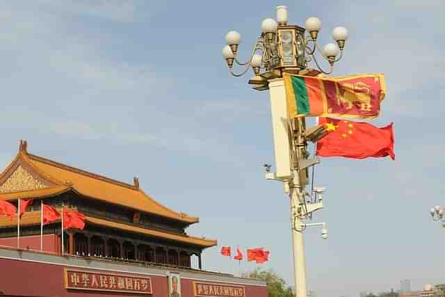 Chinese and Sri Lankan national flags hoisted at Tian'anmen Square in Beijing. 