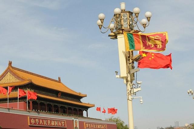 Chinese and Sri Lankan national flags hoisted at Tian'anmen Square in Beijing. 