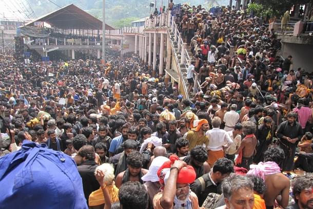 Devotees rush at the Sabarimala temple during pilgrimage season (By Avsnarayan/Wikimedia Commons)