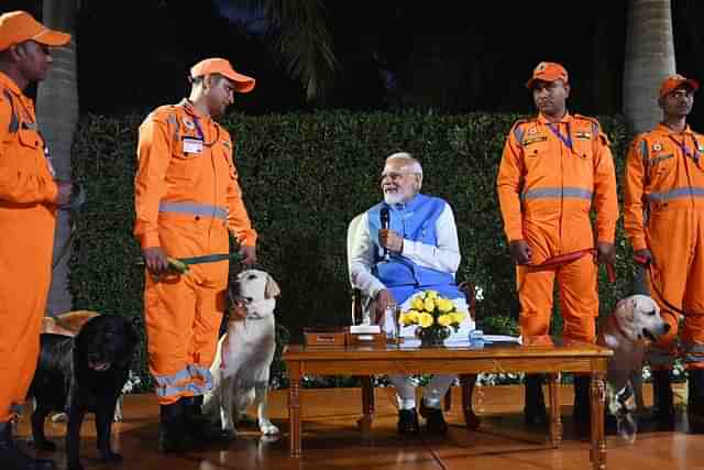 PM Modi with the NDRF team returning from earthquake-hit Turkey and Syria