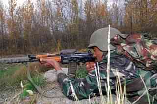 An Indian soldier with the INSAS rifle, during a military exercise. (Howard Ketter/Wikipedia). 