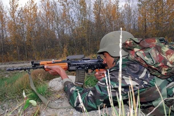 An Indian soldier with the INSAS rifle, during a military exercise. (Howard Ketter/Wikipedia).
