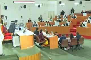 Opposition VPP MLAs stage a walkout over Governor's address in Hindi in the state assembly.
