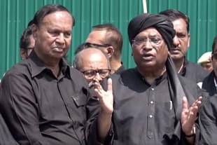 T R Baalu of DMK (L) and Congress president Mallikarjun Kharge