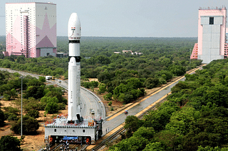 The LVM3-M3 rocket on the move days ahead of the OneWeb India-2 mission. One of the S200 strap-motors is visible at the side of the rocket. (Photo: ISRO)