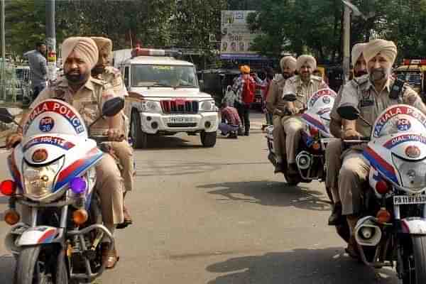 Punjab Police personnel conduct a flag march amid a crackdown against Waris Punjab De chief Amritpal Singh and his aides, in Patiala (Image: India TV)