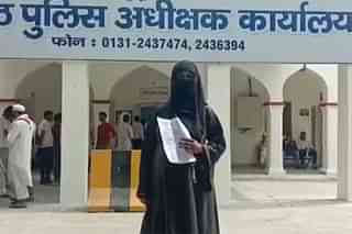 The woman outside the Muzaffarnagar police chief’s office on 16 March.