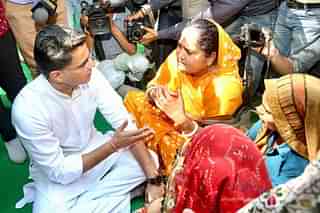 Congress leader Sachin Pilot with the wives of the slain soldiers.