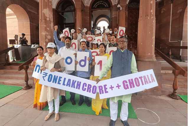 Trinamool Congress members protest outside the Parliament, demanding Adani's arrest. (Twitter).