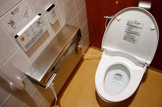 A high tech toilet from Toto, Japan with wall mounted controls. (Photo Credit: Armin Kübelbeck/Wikimedia).