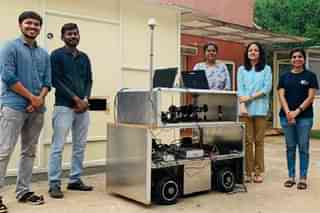 The indigenously built terrestrial vehicle which was used in the  Quantum communication system, under development, at the Raman Research Institute, Bengaluru. The project leader, Prof Urbasi Sinha is seen second from right, with her team members.