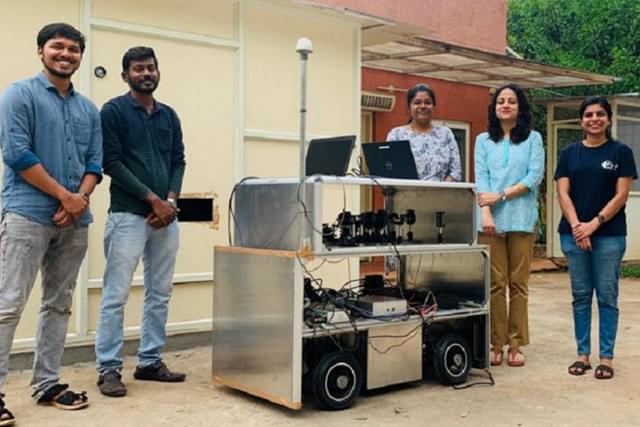 The indigenously built terrestrial vehicle which was used in the  Quantum communication system, under development, at the Raman Research Institute, Bengaluru. The project leader, Prof Urbasi Sinha is seen second from right, with her team members.