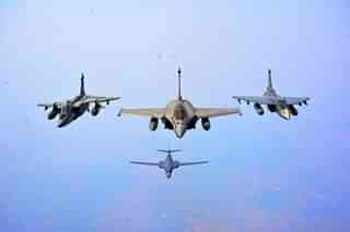 IAF's Tejas, Rafales, Jaguars and USAF's B-1B Bombers flying in formation after completion of Aero India 2023 exercises (Image via @rajatpTOI)