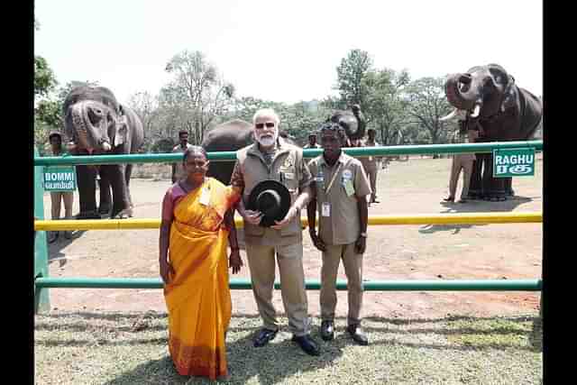 PM Modi meets Bomman and Bellie 