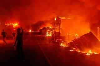 Houses torched in Imphal, Manipur, on 3 May.