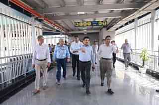 Officials supervising the train control system.