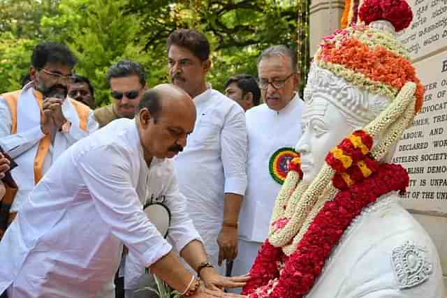 Outgoing Karnataka chief minister, Basavaraj Bommai paying obeisance to Basaveshwara 