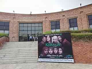 A hoarding of 'The Kerala Story' placed in front of the JNU convention centre.