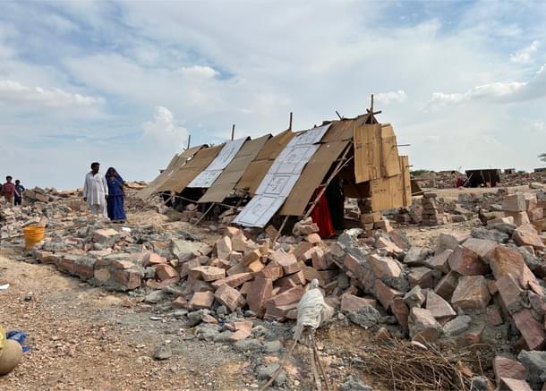 A makeshift cardboard shelter ahead of heavy rains in the night