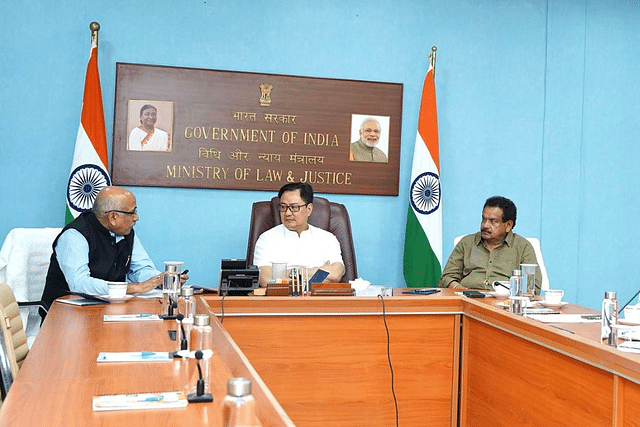 Kiren Rijiju (centre) and S P Singh Baghel (right)