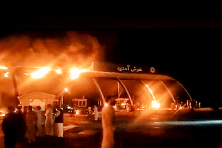 An interchange on the Swat Motorway set on fire by Pakistan Tehrik-e-Insaf protesters.  