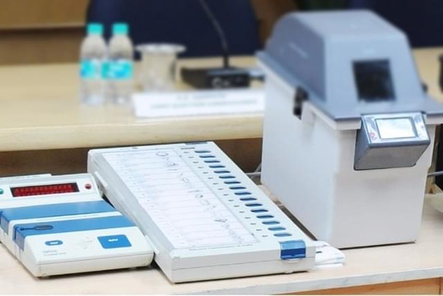 Image of a Voter Verifiable Paper Audit Trail (VVPAT) machine with an EVM, or electronic voting machine. (Photo Via PIB) 