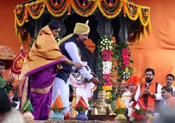 A newly wed couple at the puja from a previous year