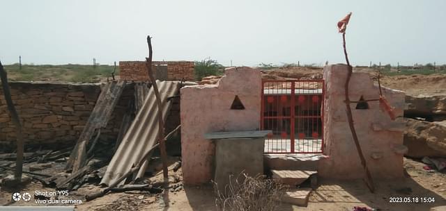 Picture of a demolished temple in the camp