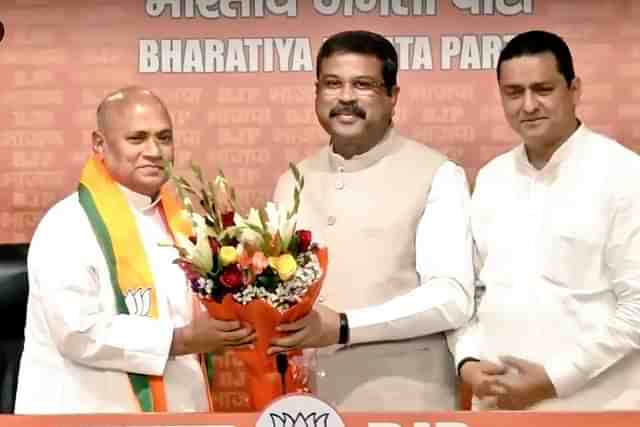 RCP Singh (L) with Union Minister, Dharmendra Pradhan