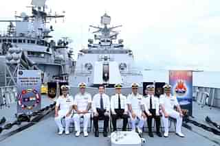 Photo session on the deck of INS Satpura for the inaugural edition of ASEAN-India Maritime Exercises (AIME) 2023.