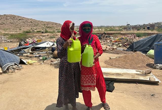 Women walked 5 km to fill 5-litre cans with drinking water
