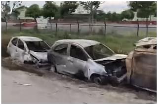 Charred vehicles in Imphal (Credit: EastMojo)