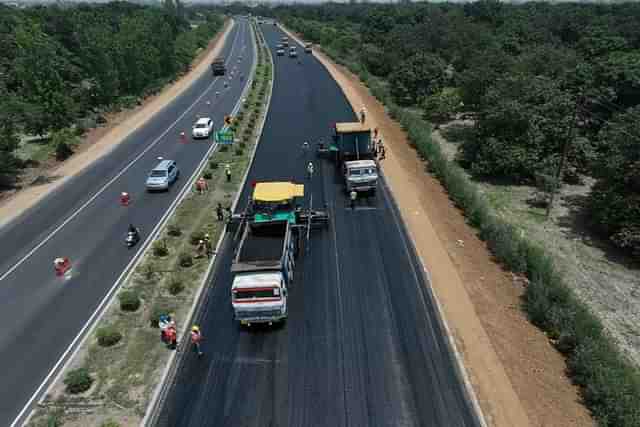 Laying of Bituminous Concrete On NH-34