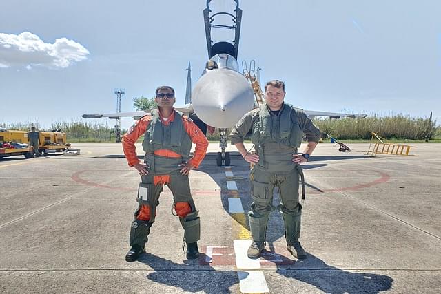 Indian Air Force and Hellenic Air Force Pilots standing in front of Sukhoi-30 MKIs 