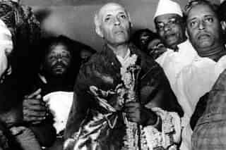 India's first PM Nehru with Sengol in his hands (Pic Via Twitter)