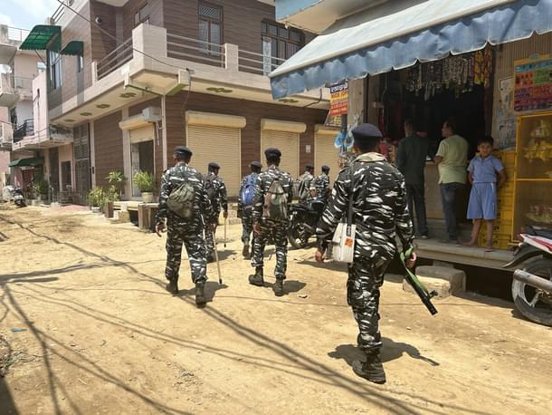 Paramilitary personnel guarding the Jain Colony in Prahaladpur in Rohini where accused lives