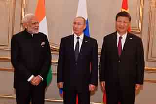 Prime Minister Narendra Modi with Chinese President Xi Jinping and Russian President Vladimir Putin at the Russia, India, China Trilateral. (@narendramodi/Twitter)
