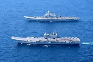 INS Vikramaditya and INS Vikrant, India's aircraft carriers, operating together at sea.