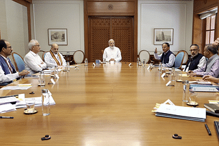 PM Modi in a review meeting (Pic via Twitter)