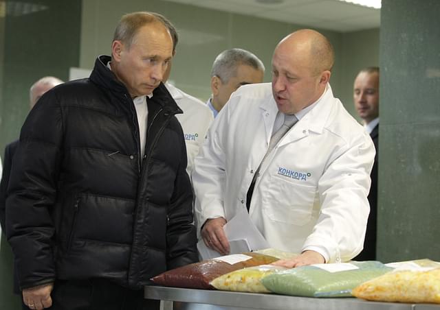 Vladimir Putin (L) tours Yevgeny Prigozhin's Concord food catering factory, in 2010 (Wikimedia Commons) 