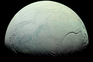 Saturn's moon Enceladus in infrared, green, and ultraviolet light, from October 2008. (Image: NASA/JPL/Space Science Institute, Processed by Kevin M Gill)