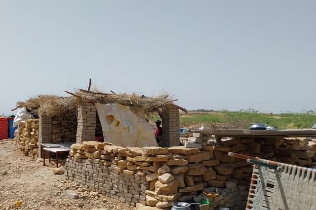 An under-construction house in Mool Sagar settlement.