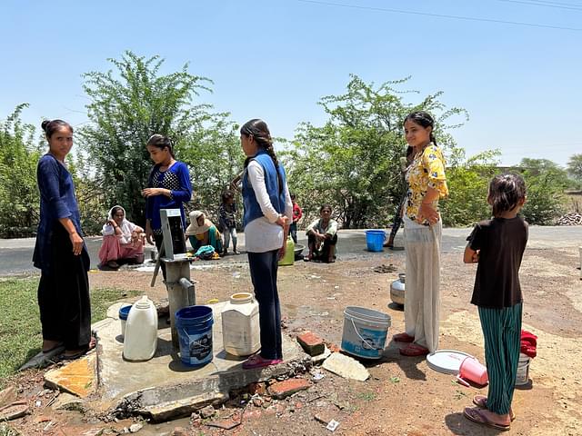 Girls filling water. The one on the extreme left in the picture is Shiva