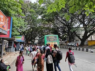 A crowded bus stand in Jayanagara on a Monday afternoon.