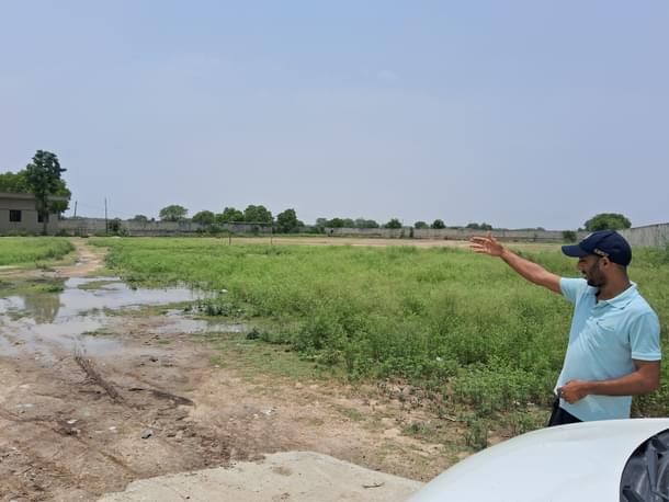 Deepak showing the condition of the sports facility which had been stalled since 2010.