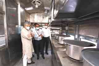 Railway Minister Ashwini Vaishnaw inspects the prototype of the converted pantry car. (Representative image)