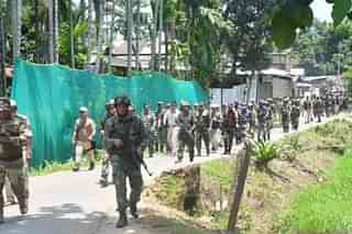 Indian Army soldiers retreating from Itham village on Saturday