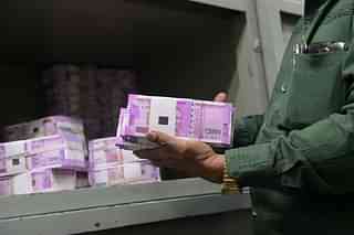 Bundles of Rs 2,000 notes.
