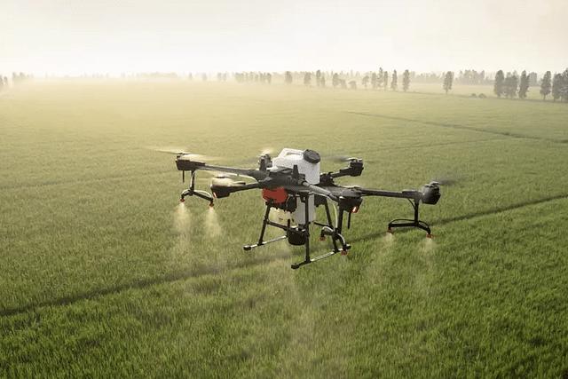 A drone spraying fertiliser. (Picture via Equinox's drones)